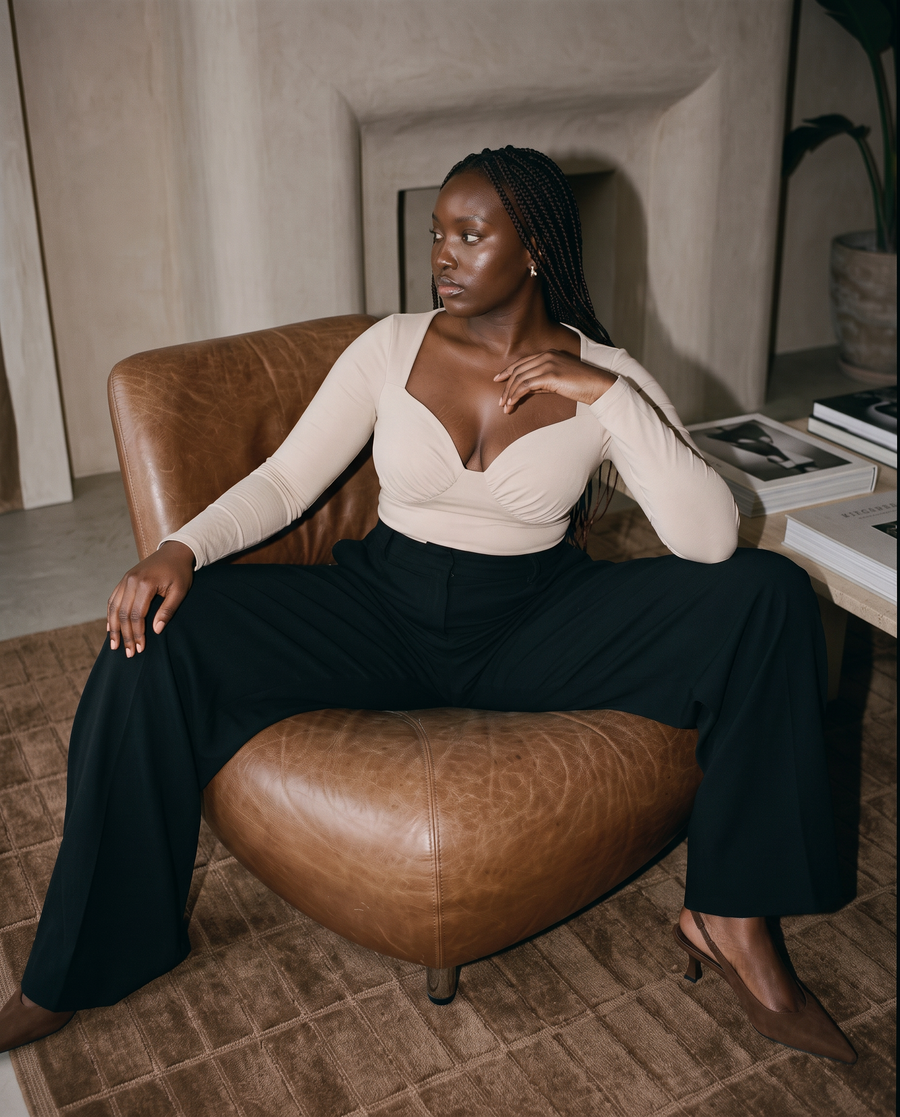 Model wearing the She Shapes Long Sleeve Flow top in Jet Stream